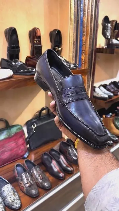Hand-polished dark purple loafers